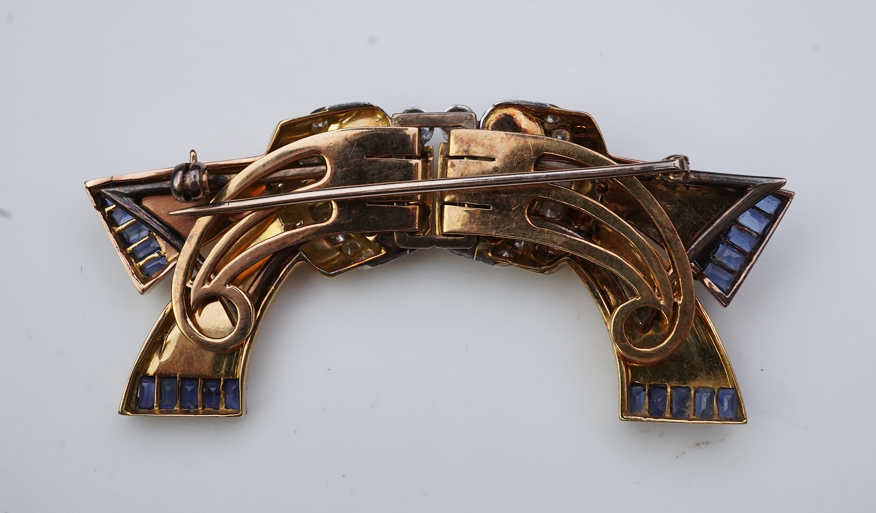 A Retro gold, sapphire and diamond double clip brooch, circa 1940